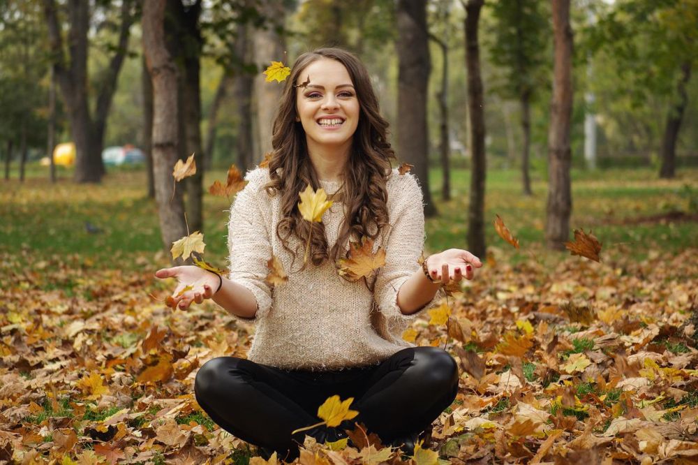 Happy student outdoors autumn