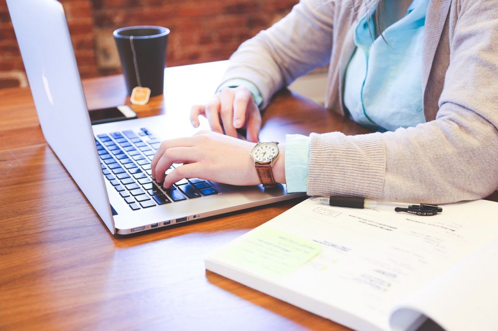 student working at laptop